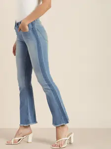 Moda Rapido Women Blue Bootcut Mid-Rise Heavy Fade Jeans With Side Stripes