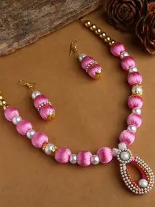 AKSHARA Gold-Plated White Stone Studded & Beaded  & Pink Silk Thread Necklace Set