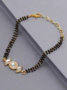 KARATCART Women Gold & Black Kundan Handcrafted Charm Bracelet