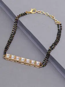 KARATCART Women Gold-Plated Black & White Beaded & Kundan Studded Bracelet