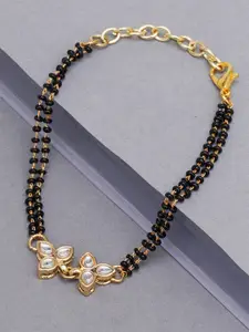 KARATCART Women Gold-Plated & Black Kundan Adjustable Charm Bracelet