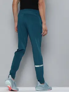 one8 x PUMA Men Teal Green Solid Virat Kohli Knitted Slim Fit Track Pants
