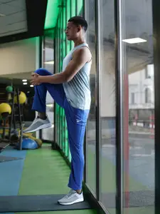 Reebok Men Blue Solid Training Track Pants