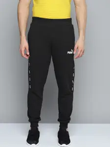 Puma Men Black Bramd Logo Printed Essential Mid Rise Sustainable Regular Fit Joggers