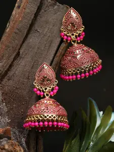 ANIKAS CREATION Pink Gold Plated Enamelled Dome Shaped Jhumkas Earrings