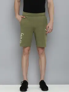 one8 x PUMA Men Olive Green Brand Logo Printed Slim Fit Sports Shorts