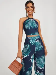 Styli Women Navy Blue Palm Print Halter Neck Crop Top and Wide Leg Trouser Co-Ords