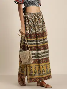 Taavi Women Beige And Red Kalamkari Printed Flared Maxi Skirt With A Side Slit