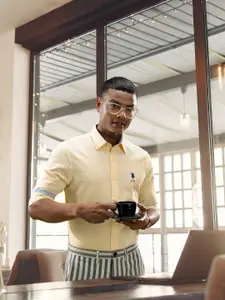 U.S. Polo Assn. U S Polo Assn Men Yellow Solid Tailored Fit Pure Cotton Casual Shirt