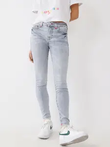 True Religion Women Super T Jennie Skinny Fit Low Distress Heavy Fade Jeans