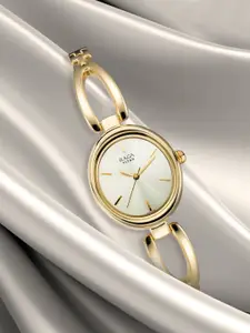 Titan Raga Viva Women Gold Analogue watch NL2579YM01