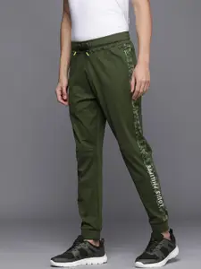 Louis Philippe ATHPLAY Men olive Green Solid Joggers With Printed Sides