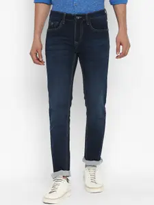 Turtle Men Navy Blue Tapered Fit Light Fade Stretchable Jeans