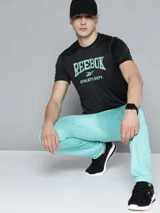 Reebok Men Brand Logo Printed Fitness WOR Speedwick T-shirt