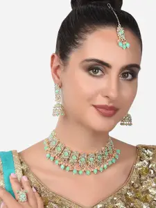 Zaveri Pearls Gold-Plated  Green Kundan Studded Jewelry Set with Mang tikka & Ring