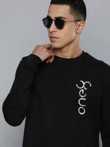 one8 x PUMA Men Black Slim Fit Virat Kohli Logo Crew Sweatshirt