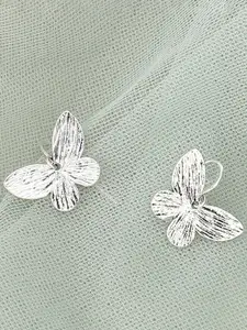 SOHI Women Silver-Toned Contemporary Studs Earrings