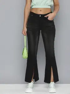 Flying Machine Women Black Flared Mid Rise Light Fade Stretchable Jeans with Slits