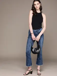 bebe Women Indigo Denim Daze Bootcut Light Fade Panelled Stretchable Jeans