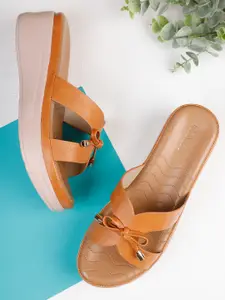ICONICS Tan Pumps with Bows