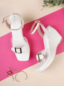 ICONICS White Embellished Wedge Sandals with Buckles
