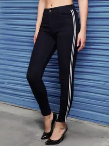 DressBerry Women Slim Fit Mid Rise Twill Tape Detailing Acid Wash Stretchable Denim Jeans