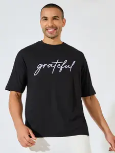 Styli Men Oversized Fit Tee with Text Chest Print