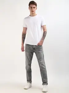 Calvin Klein Jeans Men Solid Round Neck Cotton Slim Fit T-Shirt