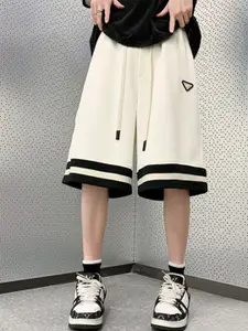 StyleCast Men Solid Loose Fit Mid-Rise Sports Shorts