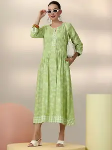 Libas Floral Printed A-Line Midi Dress with a pleated style