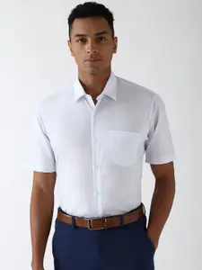 Peter England Men Spread Collar Solid Cotton Formal Shirt