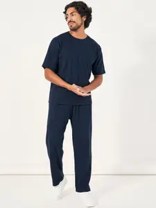 Styli Men Typographic Print Oversized T-Shirt & Open Hem Jogger Co-Ord Set