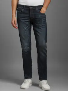 Louis Philippe Jeans Men Slim Fit Low Distress Light Fade Jeans