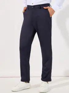 Styli Men Solid Slim Trousers with Bottom Button Placket Detail