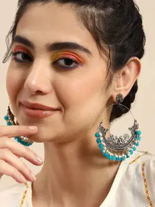 KRENOZ Silver-Plated Pearls Beaded Peacock Shaped Oxidised Chandbalis