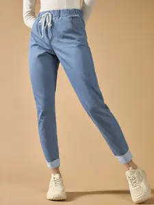 DOLCE CRUDO Women High Rise Clean Look Solid Cropped Striped Detailing Denim Joggers