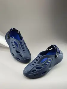 Campus Men Self Design Clogs