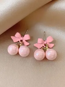 VAGHBHATT Gold-Plated Pearls Studded Bow Shaped Studs