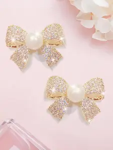 VAGHBHATT Gold-Plated Stones Studded & Pearls Beaded Bow Shaped Studs