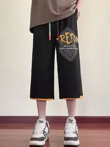 StyleCast x Revolte Men Loose Fit Typography Printed Shorts