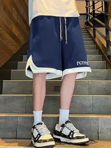 StyleCast x Revolte Men Typography Printed Mid-Rise Regular Fit Shorts