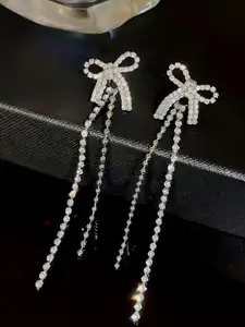 VAGHBHATT Silver-Plated Rhinestone Studded Bow Design Drop Earrings