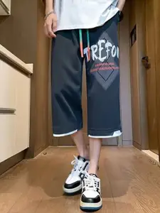 StyleCast Men Loose Fit Typography Printed Below Knee Shorts