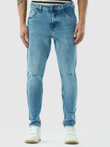 Snitch Men Light Blue Skinny Fit Mid-Rise Mildly Distressed Light Fade Stretchable Jeans