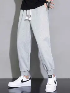 StyleCast x Revolte Men Easy Wash Mid-Rise Regular Joggers Trousers