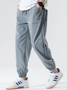StyleCast x Revolte Men Regular Fit Mid-Rise Joggers