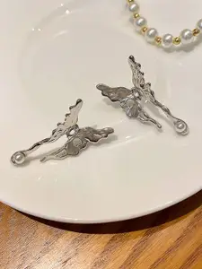 VAGHBHATT Silver-Plated Pearls Beaded Butterfly Shaped Drop Earrings