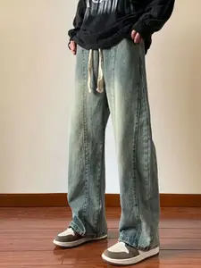 StyleCast x Revolte Men Wide Leg Medium Fade Jeans