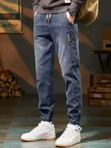 StyleCast x Revolte Men Jogger Fit Medium Shade Jeans