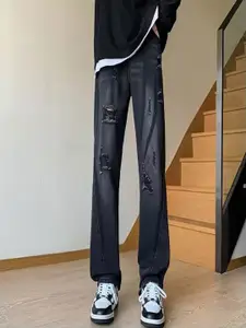 StyleCast x Revolte Men Mildly Distressed Light Fade Jeans